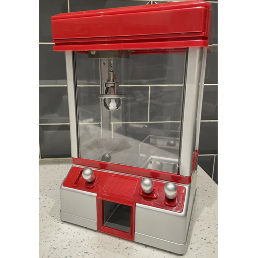 Candy grabber claw machine game